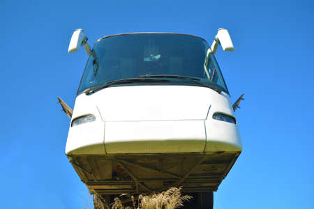 big white bus bottom taken from the photo