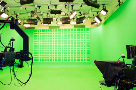 Modern empty green photo studio with modern style movie cameraの写真素材