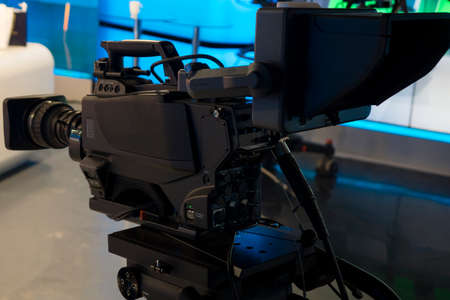 Video camera - recording show in TV studio - focus on camera