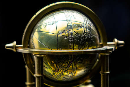 old copper astrolabe detail close up