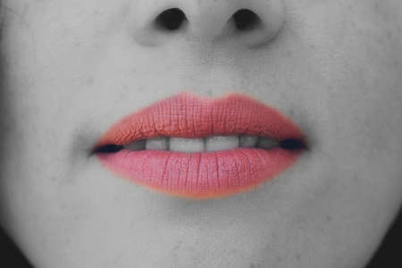 High fashion look. Glamour portrait of beautiful sexy young female woman with pink lips on black...