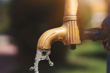 Close up old water tap. Old historic fountain in Turkeyの写真素材