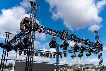 Installation of professional sound, light, video and stage equipment for a concert. Stage lighting...