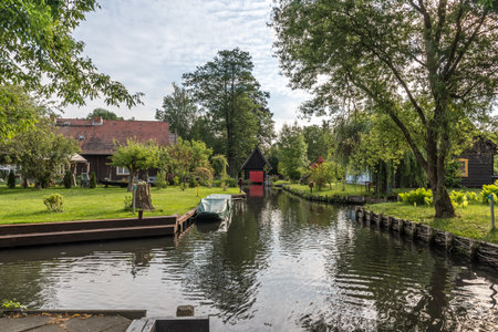 House at a crossover of water canals in biosphere reserve Spree forest (Spreewald) Germany, state Brandenburgのeditorial素材
