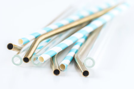 Reusable tubules for drinks, eco drinking straws without plastic, concept of sustainability, white background, isolatedの写真素材