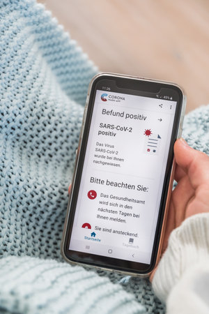 Germany - March 27th 2021: Official German Corona Warning App with a positive Covid-19 test result...