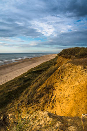 Steep overgrown sand dune on the German North Sea island Sylt, verticalの写真素材