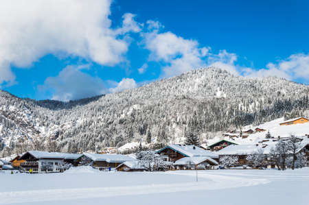 Snowy village in the German Alps and beautiful winter landscape on a sunny winter dayの写真素材