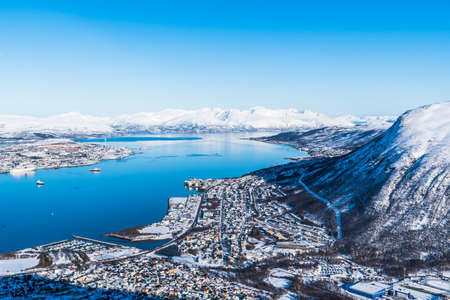 Incredible view to Tromso city in Norway from Storsteinen peak, a mountain ledge about 420 m (1378...