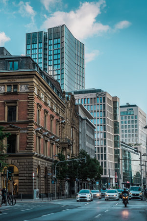 Frankfurt am Main, Germany - September 4th, 2021: Multi-lane street with old and modern buildings in the early eveningのeditorial素材