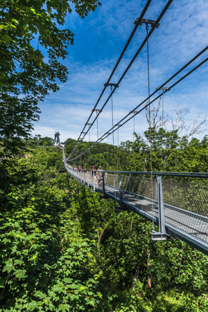 Wendefurth, Germany - 06/17/22: Titan RT rope suspension bridge over the Rappbodetalsperre in the Harz Mountains in Germany.のeditorial素材