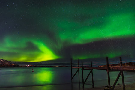 Aurora Borealis over Norway's Sommaroy Peninsula in Marchの写真素材