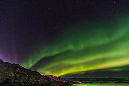 Aurora Borealis over Norway's Sommaroy Peninsula in Marchの写真素材