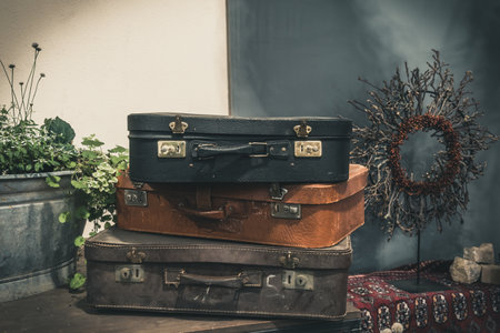 Two old classic travel leather suitcases. Travel luggage concept. Vintage decoration.の写真素材