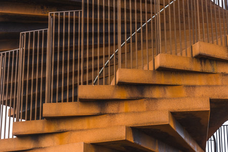 Rusty coiled steel steps of a tower in South Denmarkの写真素材