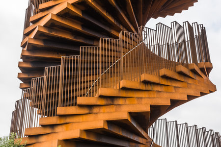 Rusty coiled steel steps of the Marsh Tower in South Denmarkの写真素材