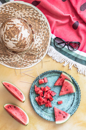 Fresh watermelon as finger food on a plate for a summer picnic, top viewの写真素材