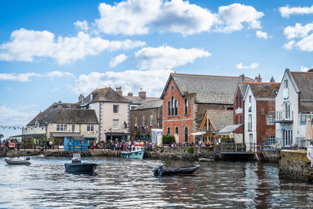 Fowey, Cornwall, UK - August 14, 2023: The busy pier in Fowey Harbour, a picturesque coastal town in Cornwall, England, UKのeditorial素材