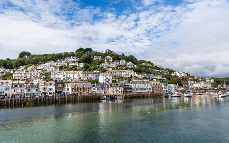 Looe, Cornwall, UK - August 13, 2023: View to East Looe, a popular holiday resort and fishing center in Cornwall, UK, during summertime.のeditorial素材