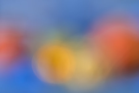 Blurred shot of autumn decoration, orange and blue colors, usable as a backgroundの写真素材