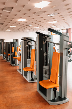 Exercise machine for strength training for arms in weight room, bodybuilding concept, verticalの写真素材