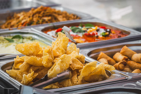 Fried dumplings, wantan, variety of Asian street food dishes in the backgroundの写真素材