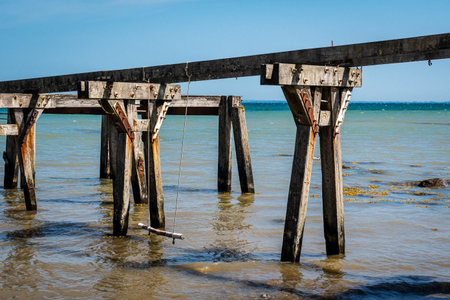Old Quern pier, wooden sea bridge, near Neukirchen on the Baltic Sea in northern Germany