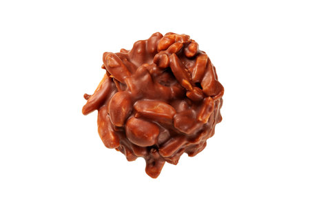 Confectionery of a milk chocolate and almond bonbon showing color and texture on a white background.の写真素材