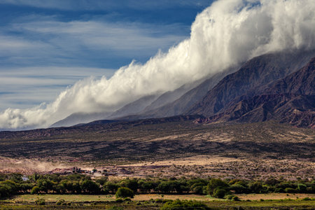 Landscape of clouds over the mountain at sunset in the CalchaquÃ­ Valley (Argentina).の写真素材