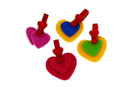 Several pairs of hearts held with the clamp of love and fidelity.の写真素材