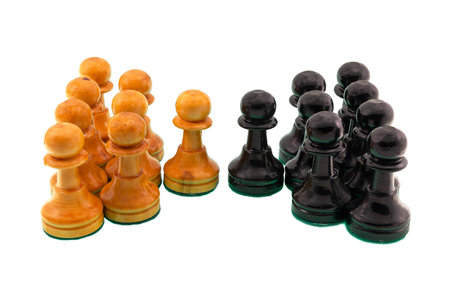 Group of black and white chess pawns in confrontation attitude as a fight, gang or dispute concept.の写真素材