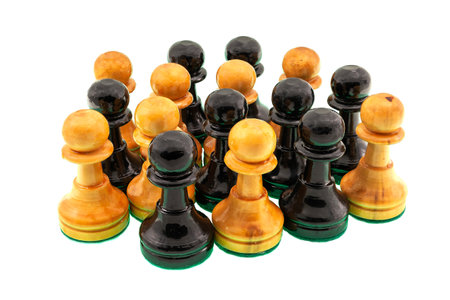 Group of chess pieces, black and white pawns, mixed together as a concept of tolerance, team and common cause.の写真素材