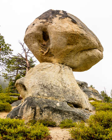 The Balancing Rock in the D. L. Bliss State Park near Lake Tahoe in California on a cloudy spring...