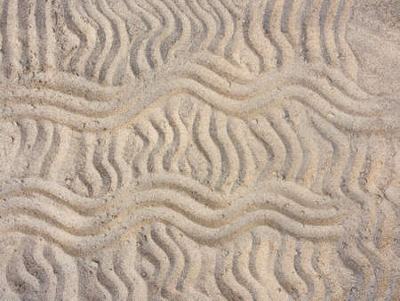 Sand painted horizontal and vertical wavy linesの写真素材