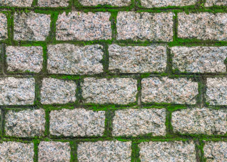 Seamless light grey masonry stone wall texture