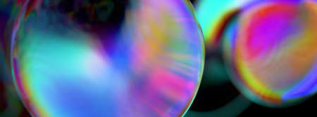 Abstract glass shape with rainbow reflections and refractionsの写真素材