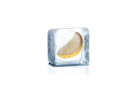 Lemon frozen in ice cubeの写真素材