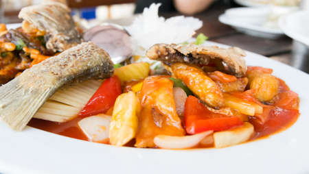 fired fish with sweet sour sauce delicious thai foodの写真素材