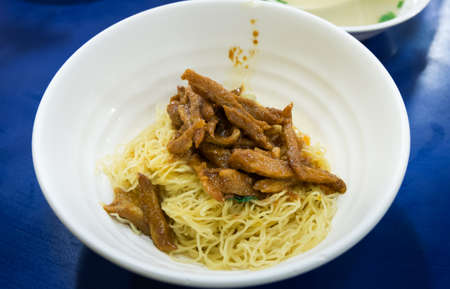 Chinese noodles with pork barbecue sauceの写真素材