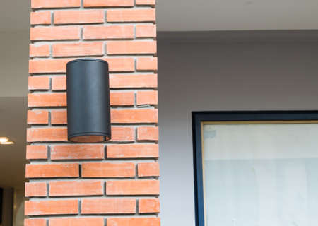 black lamps on the brown wall