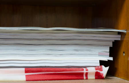 pile of documents on the deskの写真素材
