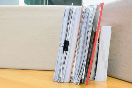 pile of documents on the office deskの写真素材
