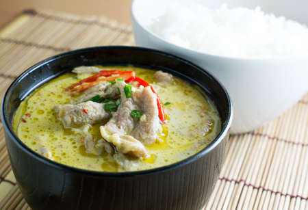 Green pork Curry with rice  Thai cuisineの写真素材