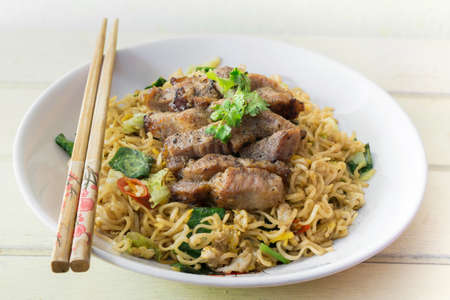 china noodle with garlic pork and vegetable, selective focus pointの写真素材