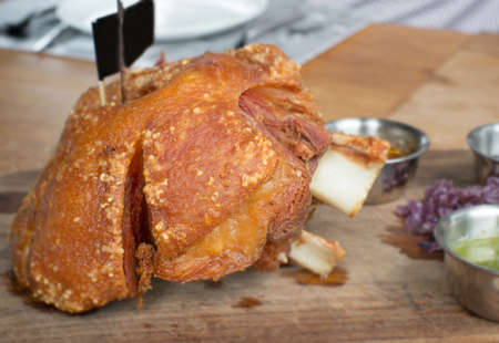 pork knuckle fried serve with sauceの写真素材