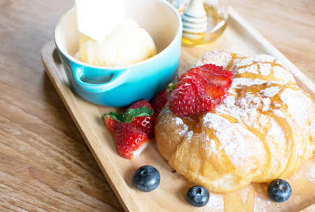 Strawberry Croissant and vanilla ice creamの写真素材