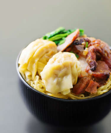 yellow noodle with roasted porkの写真素材