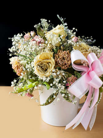 flowerpot on table and black backgroundの写真素材