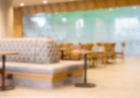 blurry table and chair in coffee shop backgroundの写真素材