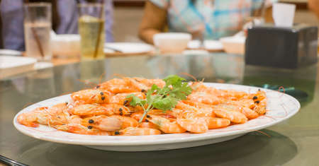 steam prawn on dinner tableの写真素材